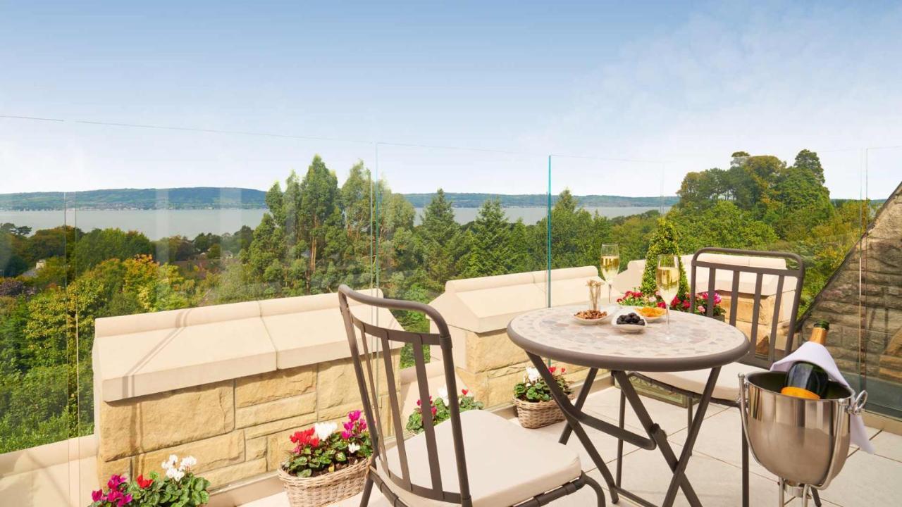 The Culloden Estate And Spa Holywood  Extérieur photo A view of the lake from the balcony of a house in the village
